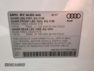 2017 Audi Q3 Premium with VIN WA1BCCFS7HR014683, listed as a Copart auction lot 54739465 with 64,917 mi miles and Salvage title. Bid and sale history available at DreamBid. Image 13.