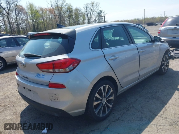 2019 Hyundai Elantra GT with VIN KMHH35LE8KU106251, listed as a IAAI auction lot 42015806 with 58,493 mi miles. Bid and sale history available at carsss.com. Image 4.