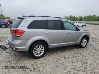 2017 Dodge Journey SXT with VIN 3C4PDCBB0HT545567, listed as a Copart auction lot 57766105 with 56,569 mi miles and Salvage title. Bid and sale history available at DreamBid. Image 3.