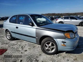 2003 Hyundai Accent with VIN KMHCF35C73U273610, listed as a Copart auction lot 85868294 with 168,203 mi miles and Salvage Title. Bid and sale history available at carsss.com. Image 4.