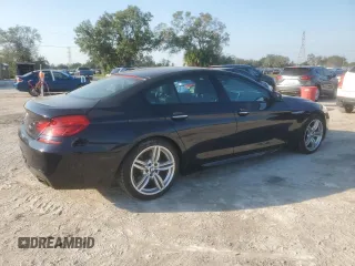 2015 BMW 6 Series 650i xDrive with VIN WBA6B4C55FD761530, listed as a Copart auction lot 75430464 with 18,729 mi miles and Salvage Title. Bid and sale history available at DreamBid. Image 3.