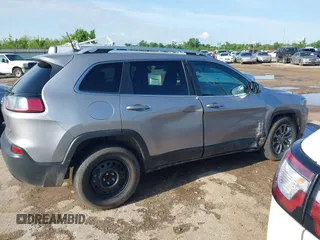 2019 Jeep Cherokee Latitude Plus with VIN 1C4PJLLB5KD403431, listed as a IAAI auction lot 42127918 with 94,360 mi miles and . Bid and sale history available at DreamBid. Image 12.