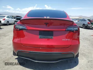 2022 Tesla Model Y Performance z VIN 7SAYGDEF9NF510183, wystawiony jako Copart lot #61263405 z przebiegiem 19 411 mil mil oraz Szkoda całkowita • Salvage title. Historia ofert i sprzedaży dostępna na DreamBid. Obrazek 6.