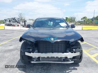 2024 BMW X4 xDrive30i z VIN 5UX33DT09R9W67695, wystawiony jako IAAI lot #42087562 z przebiegiem 20 324 mil mil oraz . Historia ofert i sprzedaży dostępna na DreamBid. Obrazek 6.