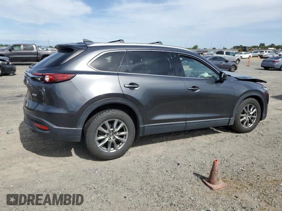 2019 Mazda CX-9 Touring with VIN JM3TCBCY0K0309947, listed as a Copart auction lot 56897815 with 87,517 mi miles and Salvage title. Bid and sale history available at DreamBid. Image 3.
