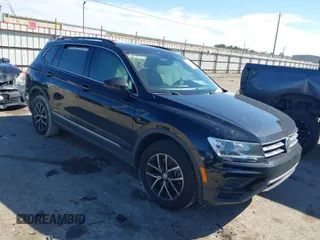 2021 Volkswagen Tiguan SE with VIN 3VV3B7AX4MM095811, listed as a IAAI auction lot 41476490 with 25,668 mi miles and . Bid and sale history available at DreamBid. Image 1.