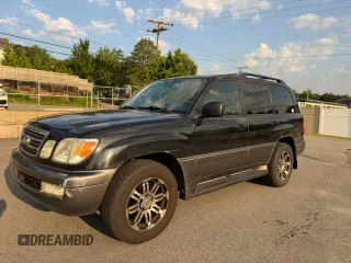 2004 Lexus LX 470 with VIN JTJHT00W44354386, listed as a Copart auction lot 63816455 with 389,442 mi miles and Clean title. Bid and sale history available at DreamBid. Image 2.
