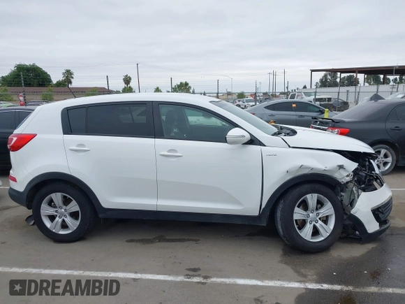 2013 Kia Sportage LX with VIN KNDPBCA21D7356092, listed as a IAAI auction lot 42111086 with 102,521 mi miles and . Bid and sale history available at carsss.com. Image 13.