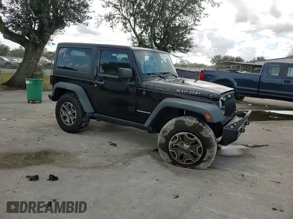2016 Jeep Wrangler Rubicon with VIN 1C4BJWCG3GL162649, listed as a Copart auction lot 86327414 with 131,407 mi miles and Salvage title. Bid and sale history available at DreamBid. Image 11.