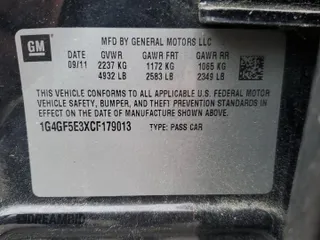 2012 Buick LaCrosse Premium 2 z VIN 1G4GF5E3XCF179013, wystawiony jako Copart lot #56324865 z przebiegiem 137 700 mil mil oraz Czysty tytuł • Clean title. Historia ofert i sprzedaży dostępna na DreamBid. Obrazek 12.