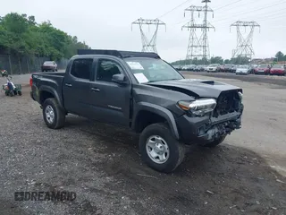 2017 Toyota Tacoma SR5 with VIN 3TMCZ5ANXHM089093, listed as a IAAI auction lot 42513711 with 86,022 mi miles and . Bid and sale history available at DreamBid. Image 1.