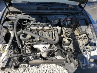 2013 Ford Taurus Limited z VIN 1FAHP2F83DG221702, wystawiony jako Copart lot #51580255 z przebiegiem 174 364 mil mil oraz Szkoda całkowita • Salvage title. Historia ofert i sprzedaży dostępna na DreamBid. Obrazek 7.