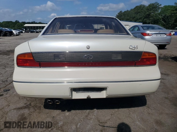 1994 Infiniti Q45 z VIN JNKNG01D3RM252218, wystawiony jako Copart lot #55309475 z przebiegiem 69 073 mil mil oraz Czysty tytuł • Clean title. Historia ofert i sprzedaży dostępna na DreamBid. Obrazek 6.