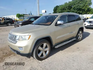 2011 Jeep Grand Cherokee Overland with VIN 1J4RR6GG4BC621661, listed as a Copart auction lot 59728925 with 164,363 mi miles and Salvage title. Bid and sale history available at DreamBid. Image 1.