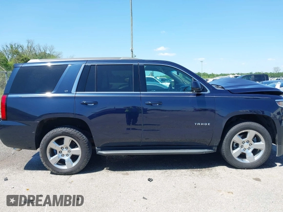 2018 Chevrolet Tahoe LT with VIN 1GNSCBKC0JR138385, listed as a IAAI auction lot 41977300 with 104,987 mi miles and . Bid and sale history available at DreamBid. Image 13.