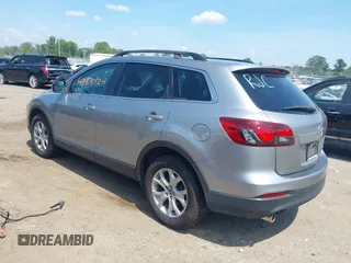 2015 Mazda CX-9 Sport z VIN JM3TB2BA3F0451593, wystawiony jako IAAI lot #42870124 z przebiegiem 196 390 mil mil oraz . Historia ofert i sprzedaży dostępna na DreamBid. Obrazek 3.