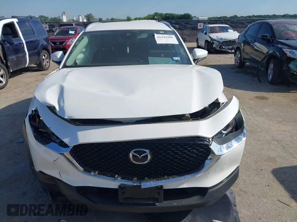 2023 Mazda CX-30 S Carbon Edition with VIN 3MVDMBCM2PM552282, listed as a IAAI auction lot 42241909 with 14,765 mi miles and . Bid and sale history available at DreamBid. Image 12.