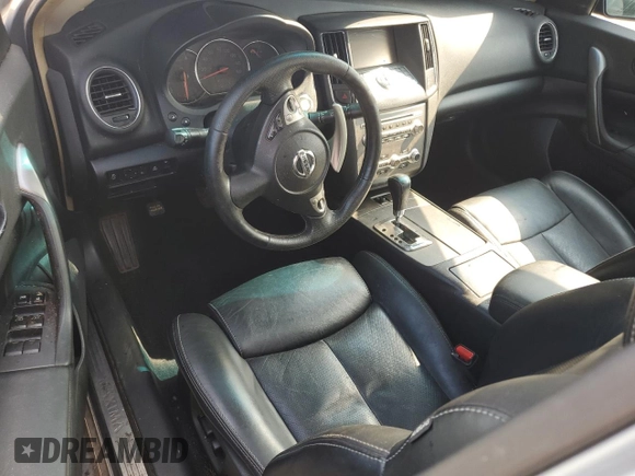 2014 Nissan Maxima S с VIN 1N4AA5AP5EC497505, выставлен на аукционе Copart как лот 63037705 с пробегом 154 275 миль миль и Списание • Salvage title. История ставок и продаж доступна на DreamBid. Изображение 8.