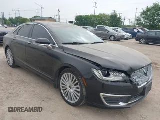 2017 Lincoln MKZ Reserve z VIN 3LN6L5EC4HR619712, wystawiony jako IAAI lot #41899418 z przebiegiem 77 481 mil mil oraz . Historia ofert i sprzedaży dostępna na DreamBid. Obrazek 1.