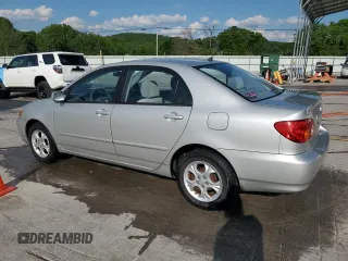 2003 Toyota Corolla CE with VIN 1NXBR32E33Z188532, listed as a Copart auction lot 54832785 with 104,640 mi miles and Salvage Title. Bid and sale history available at DreamBid. Image 2.