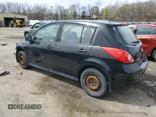 2009 Nissan Versa S with VIN 3N1BC13E49L363630, listed as a Copart auction lot 53118515 with 135,573 mi miles and Salvage Title. Bid and sale history available at DreamBid. Image 2.