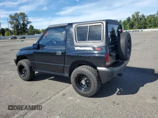 1998 Chevrolet Tracker z VIN 2CNBJ1868W6925819, wystawiony jako Copart lot #70881874 z przebiegiem 180 849 mil mil oraz Szkoda całkowita • Salvage title. Historia ofert i sprzedaży dostępna na DreamBid. Obrazek 2.