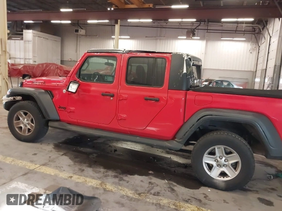 2020 Jeep Gladiator Sport S z VIN 1C6HJTAGXLL125496, wystawiony jako IAAI lot #41749633 z przebiegiem 56 203 mil mil oraz . Historia ofert i sprzedaży dostępna na DreamBid. Obrazek 14.