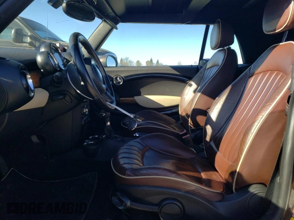 2012 MINI Convertible with VIN WMWZN3C55CT133967, listed as a Copart auction lot 88546705 with 104,357 mi miles and Non repairable. Bid and sale history available at DreamBid. Image 7.