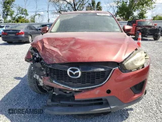 2013 Mazda CX-5 Sport with VIN JM3KE2BEXD0139032, listed as a Copart auction lot 55019325 with 108,555 mi miles and Salvage title. Bid and sale history available at DreamBid. Image 5.