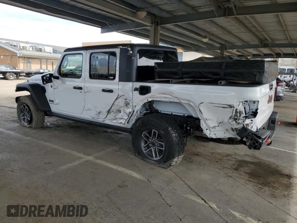 2024 Jeep Gladiator Mojave X с VIN 1C6JJTEGXRL105429, выставлен на аукционе Copart как лот 49850525 с пробегом 4 692 миль миль и Списание • Salvage title. История ставок и продаж доступна на DreamBid. Изображение 2.