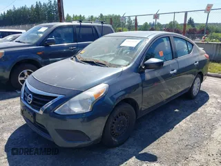 2015 Nissan Versa SV with VIN 3N1CN7AP4FL810975, listed as a IAAI auction lot 42643990 with 165,301 mi miles and . Bid and sale history available at DreamBid. Image 2.