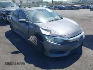 2018 Honda Civic LX with VIN 2HGFC2F57JH546731, listed as a IAAI auction lot 41979976 with 137,531 mi miles. Bid and sale history available at carsss.com. Image 1.