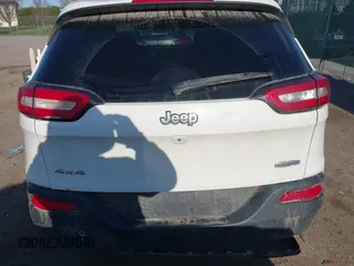 2016 Jeep Cherokee Latitude with VIN 1C4PJMCB1GW204412, listed as a IAAI auction lot 42031132 with 228,442 mi miles and . Bid and sale history available at carsss.com. Image 16.