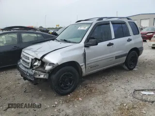 2002 Chevrolet Tracker z VIN 2CNBE13C926934704, wystawiony jako Copart lot #70717194 z przebiegiem 189 076 mil mil oraz Szkody całkowita. Historia ofert i sprzedaży dostępna na DreamBid. Obrazek 1.
