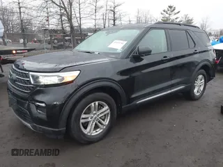 2023 Ford Explorer XLT with VIN 1FMSK8DH8PGA89282, listed as a IAAI auction lot 41453791 with 30,309 mi miles and . Bid and sale history available at carsss.com. Image 2.