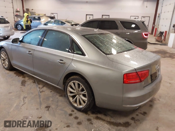 2012 Audi A8 with VIN WAURVAFD7CN021716, listed as a IAAI auction lot 42330229 with 97,359 mi miles and . Bid and sale history available at DreamBid. Image 3.