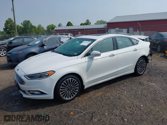 2018 Ford Fusion Titanium with VIN 3FA6P0D97JR247621, listed as a IAAI auction lot 42465608 with 174,983 mi miles and . Bid and sale history available at DreamBid. Image 2.