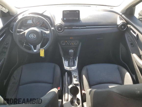 2016 Scion iA z VIN 3MYDLBZV4GY144476, wystawiony jako Copart lot #47667595 z przebiegiem 55 060 mil mil oraz Szkoda całkowita • Salvage title. Historia ofert i sprzedaży dostępna na DreamBid. Obrazek 8.