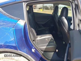 2020 Tesla Model Y Long Range with VIN 5YJYGDEF4LF000494, listed as a IAAI auction lot 41894856 with 118,638 mi miles and . Bid and sale history available at DreamBid. Image 8.