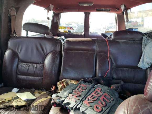 1997 GMC Suburban z VIN 3GKFK16R3VG511306, wystawiony jako Copart lot #78504814 z przebiegiem 287 079 mil mil oraz Szkoda całkowita • Salvage title. Historia ofert i sprzedaży dostępna na DreamBid. Obrazek 10.