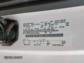 2015 Ford F-150 XL with VIN 1FTMF1C89FKD69802, listed as a Copart auction lot 47600995 with 107,896 mi miles and Salvage title. Bid and sale history available at DreamBid. Image 13.
