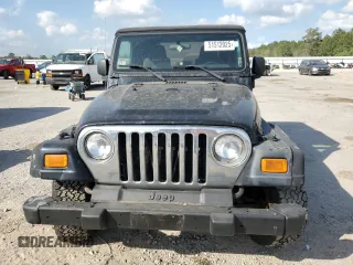 2005 Jeep Wrangler X with VIN 1J4FA39S15P310714, listed as a Copart auction lot 51512025 with 214,218 mi miles and Clean Title. Bid and sale history available at carsss.com. Image 5.