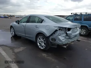 2017 Mazda 6 Touring with VIN JM1GL1V55H1102707, listed as a IAAI auction lot 42179510 with 86,841 mi miles and . Bid and sale history available at carsss.com. Image 3.