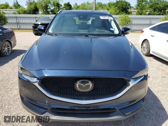 2018 Mazda CX-5 Grand Touring с VIN JM3KFBDM8J0344328, выставлен на аукционе Copart как лот 57665175 с пробегом 131 175 миль миль и Списание • Salvage title. История ставок и продаж доступна на DreamBid. Изображение 5.