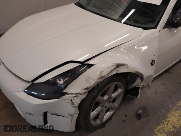 2005 Nissan 350Z Touring with VIN JN1AZ36A45M754923, listed as a IAAI auction lot 41720671 with 124,916 mi miles. Bid and sale history available at carsss.com. Image 6.