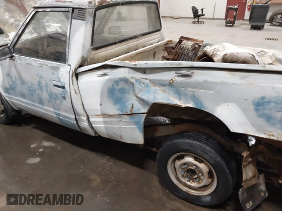 1982 Datsun 720 z VIN JN6MD01S7CW103064, wystawiony jako IAAI lot #41831434 z przebiegiem 175 954 mil mil oraz . Historia ofert i sprzedaży dostępna na DreamBid. Obrazek 16.