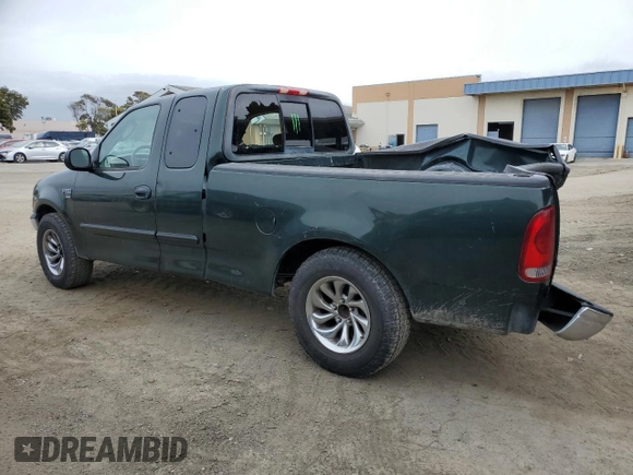 2003 Ford F-150 XL with VIN 1FTRX17L73KA47012, listed as a Copart auction lot 47410495 with 206,967 mi miles and Salvage title. Bid and sale history available at DreamBid. Image 2.