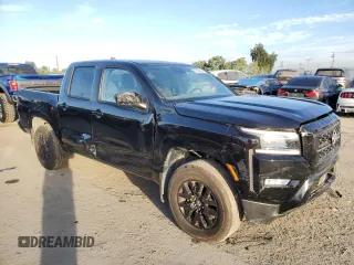 2023 Nissan Frontier SV with VIN 1N6ED1EK6PN614006, listed as a Copart auction lot 77823854 with 14,500 mi miles and Salvage Title. Bid and sale history available at carsss.com. Image 4.