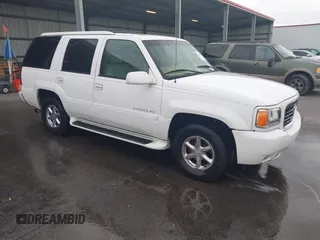 2000 Cadillac Escalade z VIN 1GYEK13R3YR142490, wystawiony jako IAAI lot #42196570 z przebiegiem 269 960 mil mil oraz . Historia ofert i sprzedaży dostępna na DreamBid. Obrazek 1.
