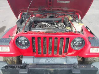 2001 Jeep Wrangler Sport z VIN 1J4FA49S31P335680, wystawiony jako IAAI lot #42471312 z przebiegiem 212 927 mil mil oraz . Historia ofert i sprzedaży dostępna na DreamBid. Obrazek 10.